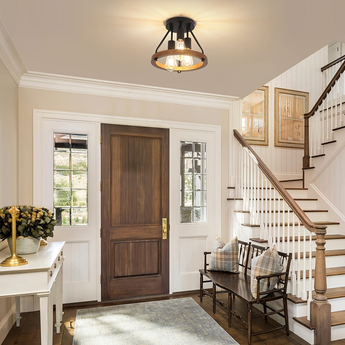 Three bulb wood and metal ceiling light in an entryway