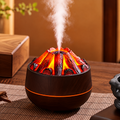 Dark wood grain diffuser with glowing decorative logs and mist