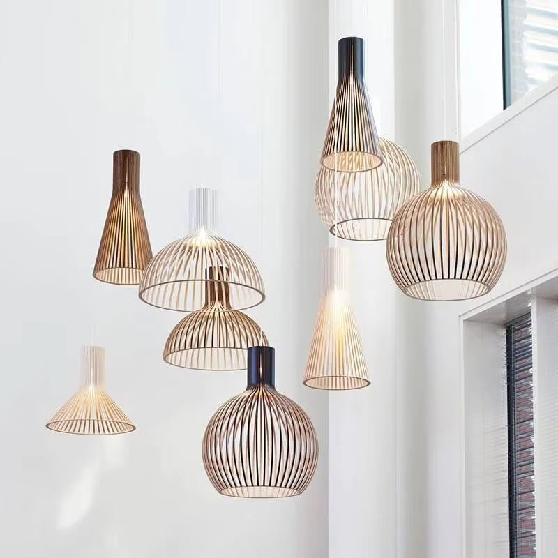 Wood pendant light collection displayed in different shapes and finishes
