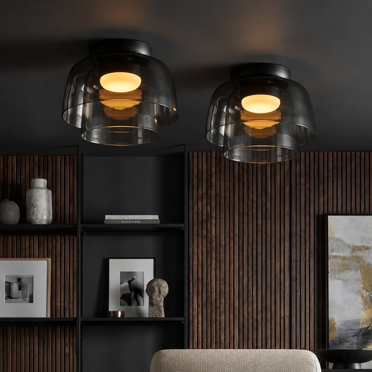 Pair of smoke gray ceiling lights against dark wood shelving.