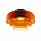 Orange three-layer wide ceiling light on white.