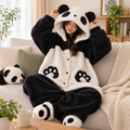 Panda wearable blanket hoodie worn on a living room sofa