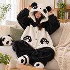 Panda wearable blanket hoodie worn on a living room sofa