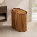 Wood grain oval trash can in a warm contemporary bathroom