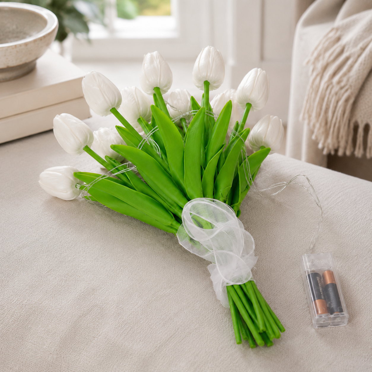 White faux tulip LED bouquet with clear battery holder and ribbon bow