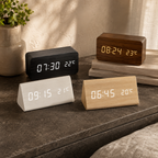 Voice controlled LED alarm clocks in black brown white and natural wood finishes