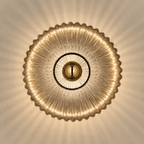 Symmetrical lit ribbed glass wall sconce in smoke gray