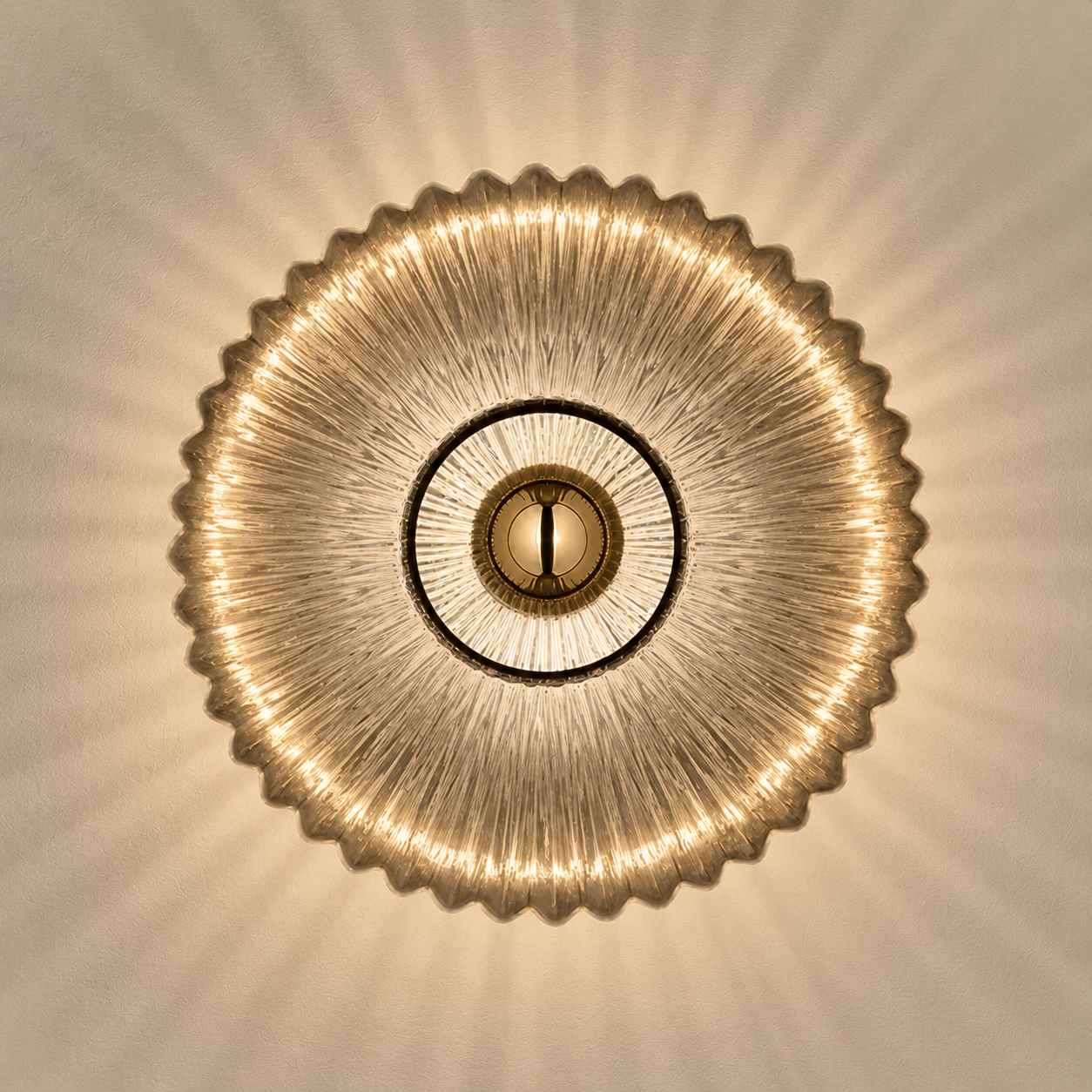 Symmetrical lit ribbed glass wall sconce in smoke gray