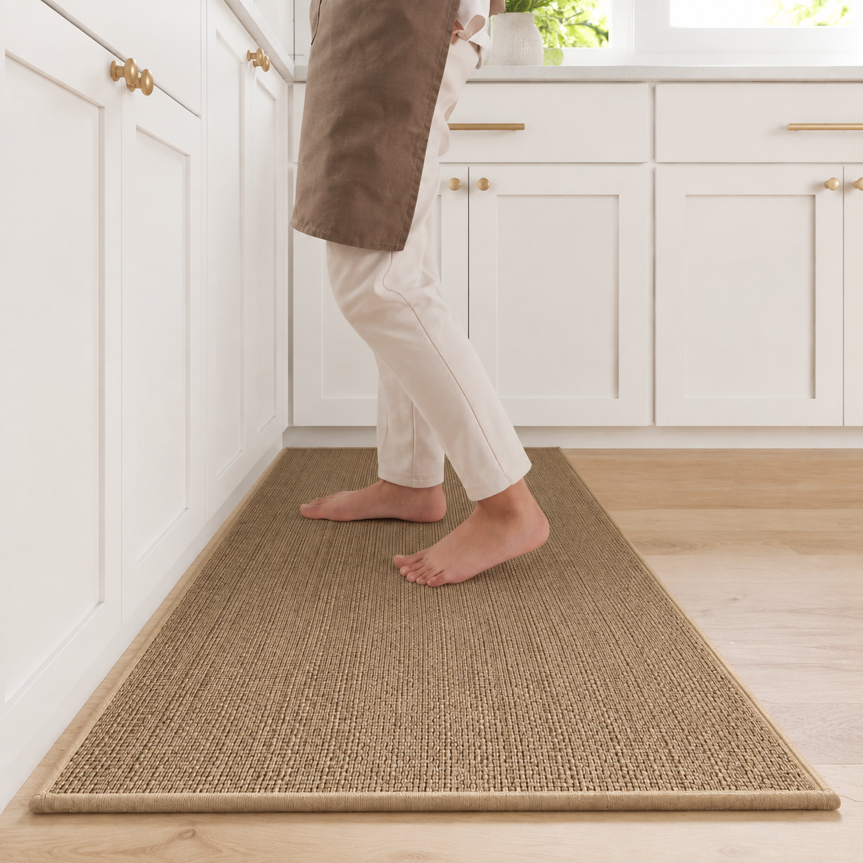 Khaki faux sisal kitchen runner rug on a light oak floor
