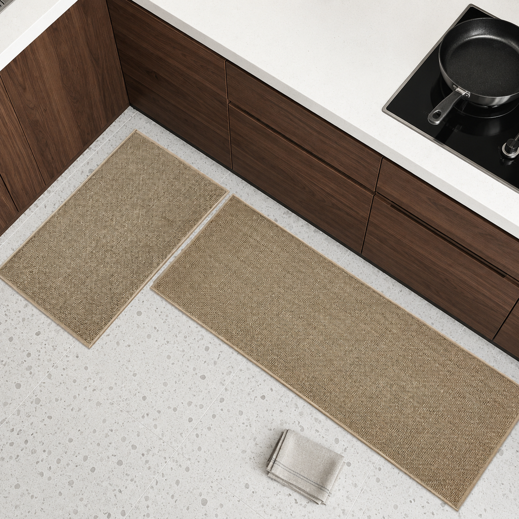 Two khaki faux sisal kitchen mats arranged beside walnut cabinets