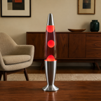 Red wax motion lava lamp glowing in an American mid-century living room